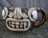 Handmade stoneware tiki mug