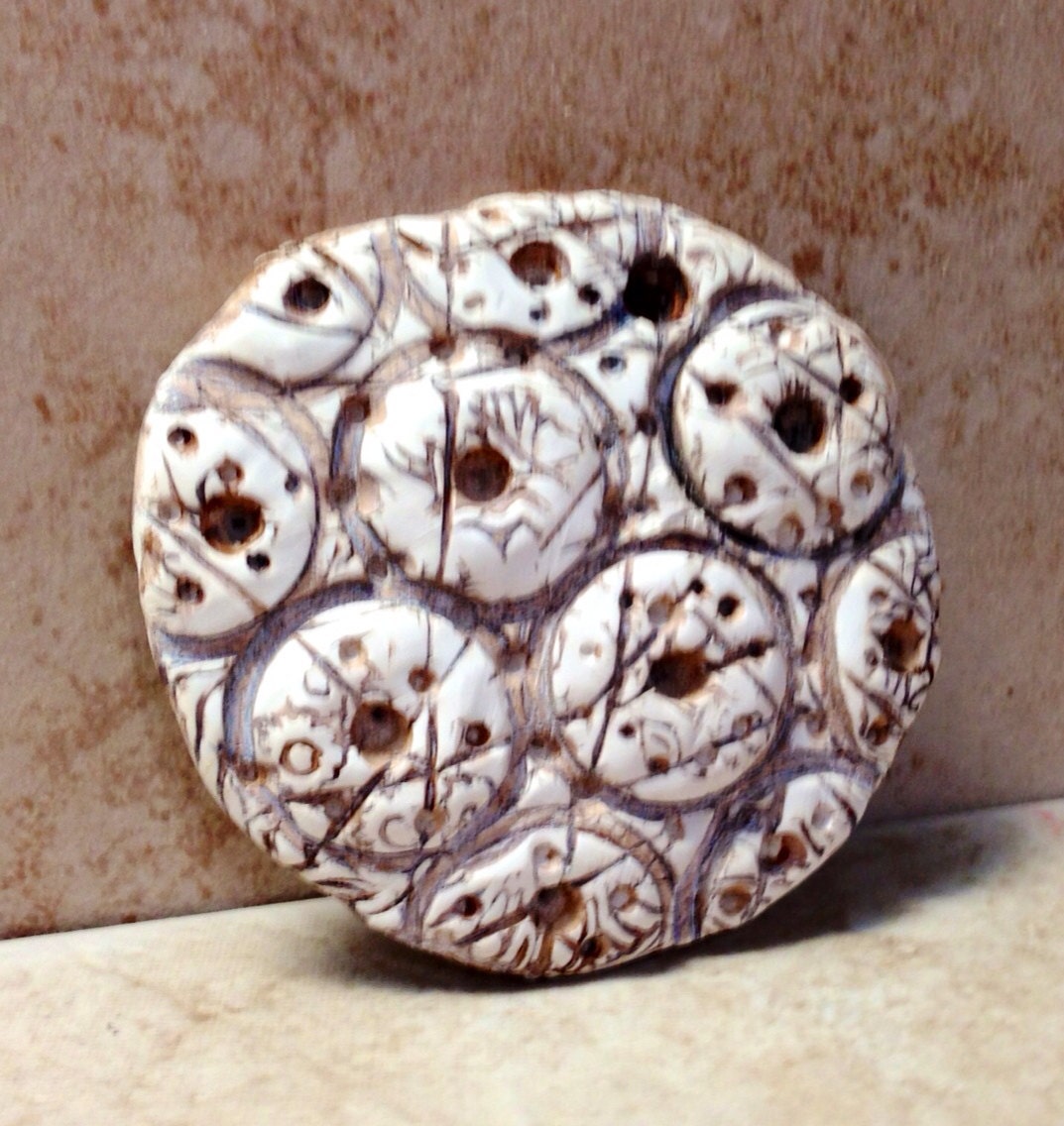 Fossil sea urchin handmade polymer clay pendant