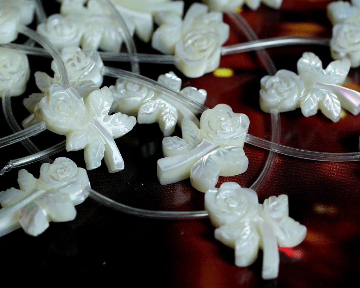 MOP carved flower white aprox 22x16mm, 4 pcs (item ID L12MOPCFW)