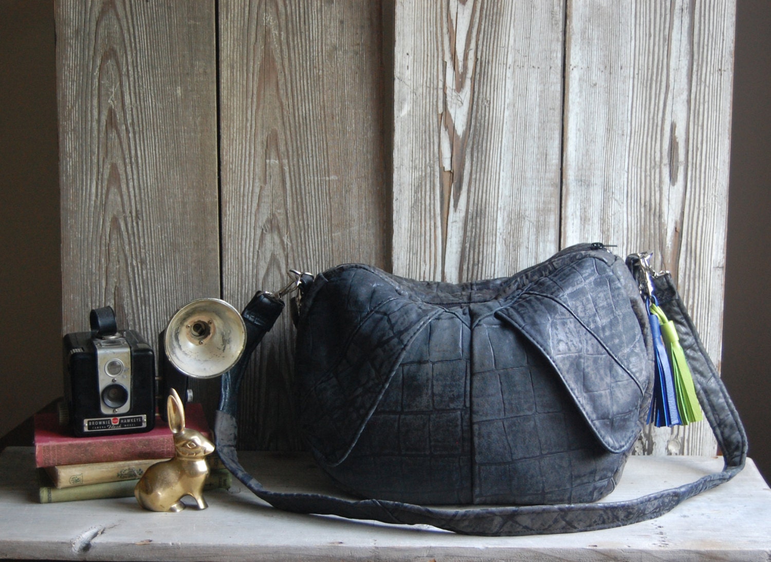 FURROW /// black leather slouchy bag with red and blue tassel