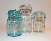 Three Vintage Ball and Atlas Canning Jars blue with wire closure, glass lids