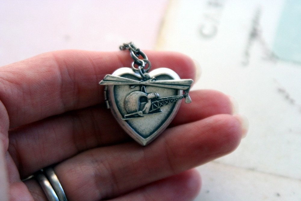 helicopter. locket necklace. silver ox