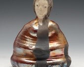 Buddha Statue in a Red Copper Silver Raku Robe