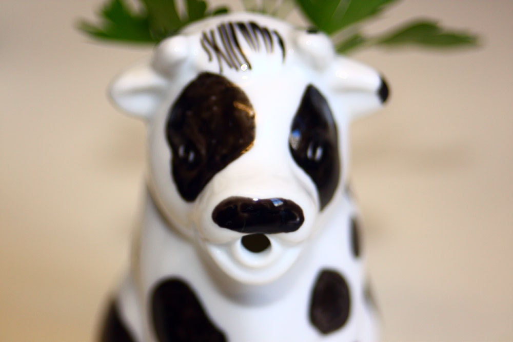 Small handpainted ceramic cow milk jug