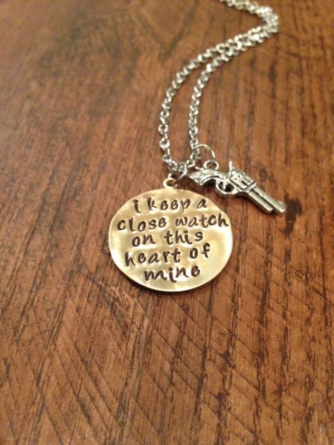I keep a close watch necklace