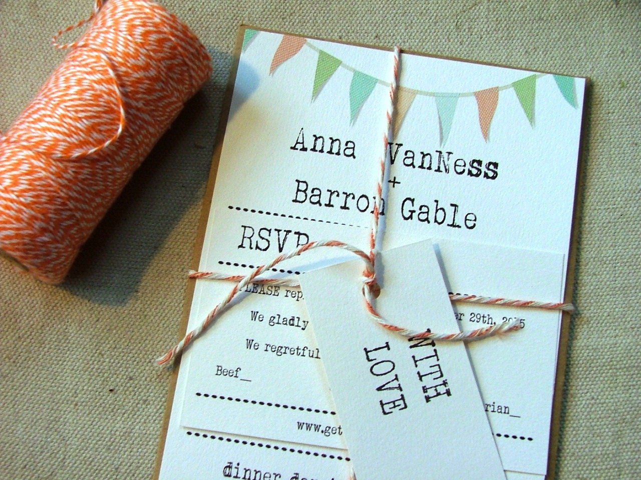 Pastel Wedding Invitations: typewriter font, peach and mint green garland