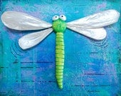 A colorful collage painting with 3D Dragonfly
