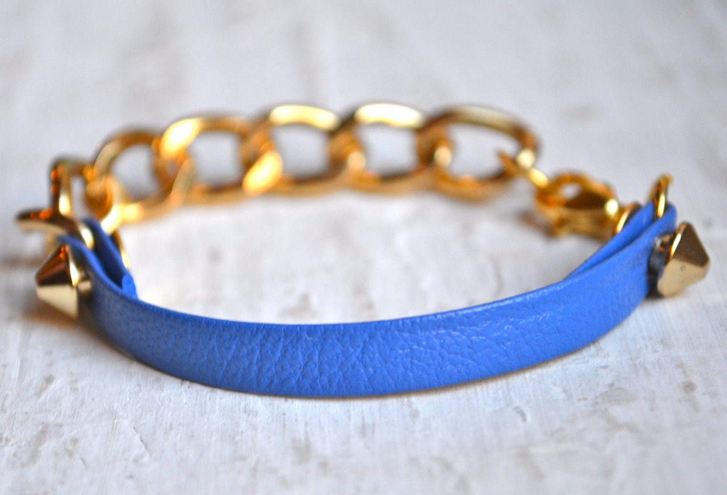 bright blue thin leather spike and chain layering bracelet