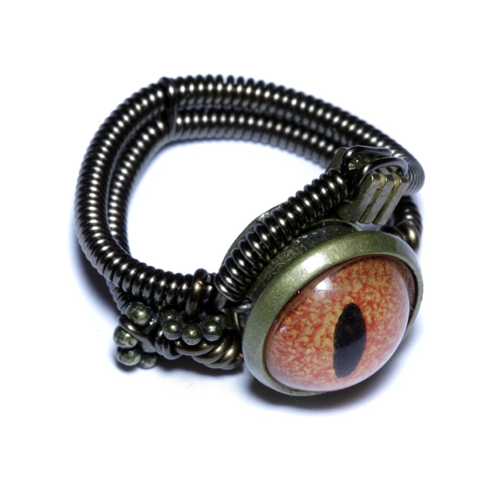 Steampunk Jewelry - Ring - Orange taxidermy glass Eye - SIZE 7.5 ONLY