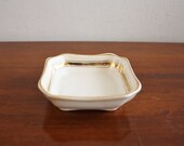 Vintage porcelain dish with gold trim