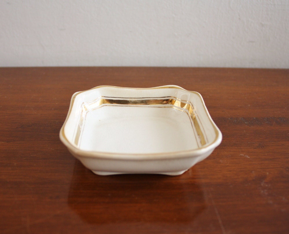 Vintage porcelain dish with gold trim