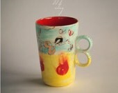 Handmade Hand glazed ceramic mug in yellow turquoise and red