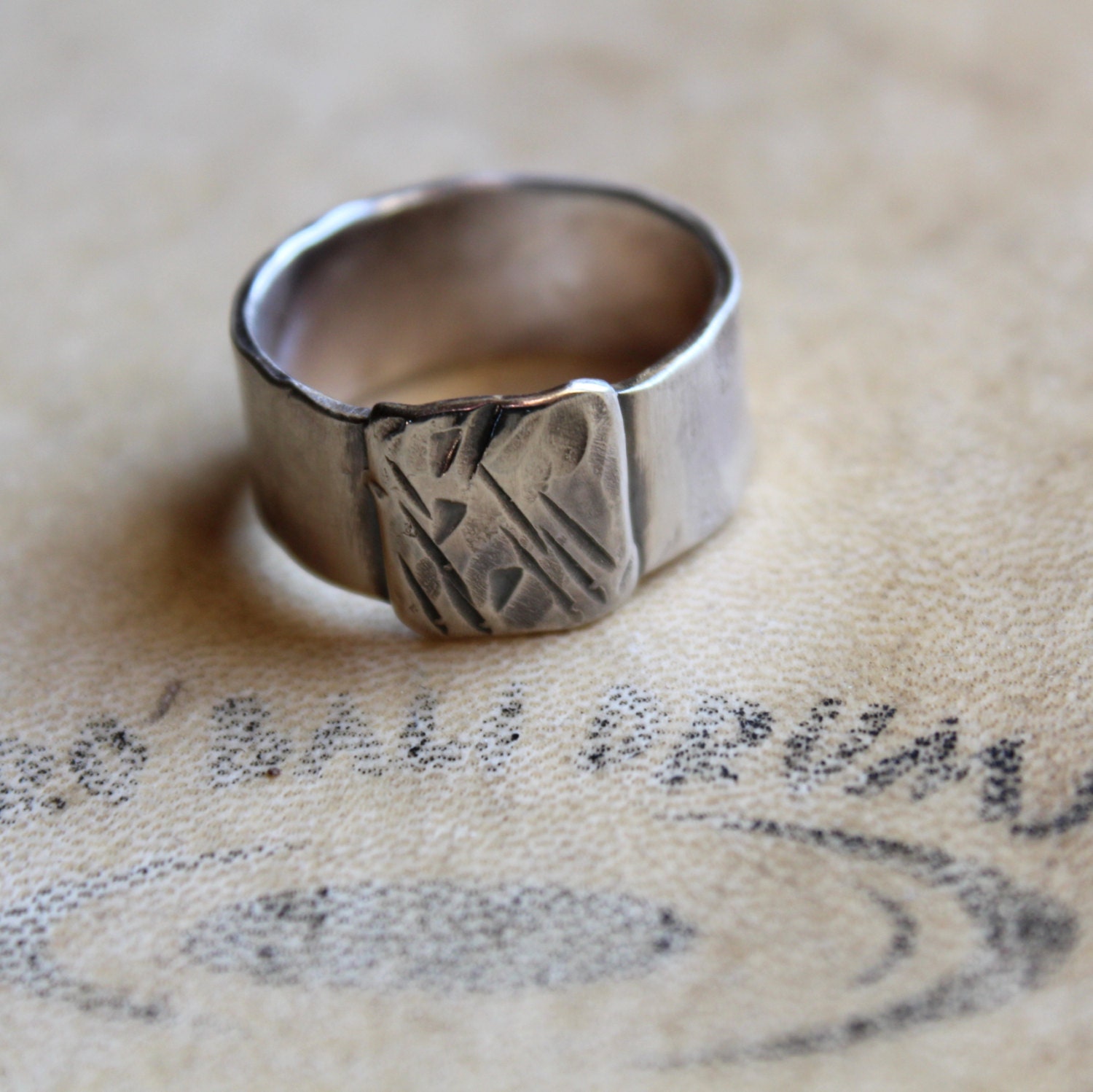 Mens ring of rugged sterling silver
