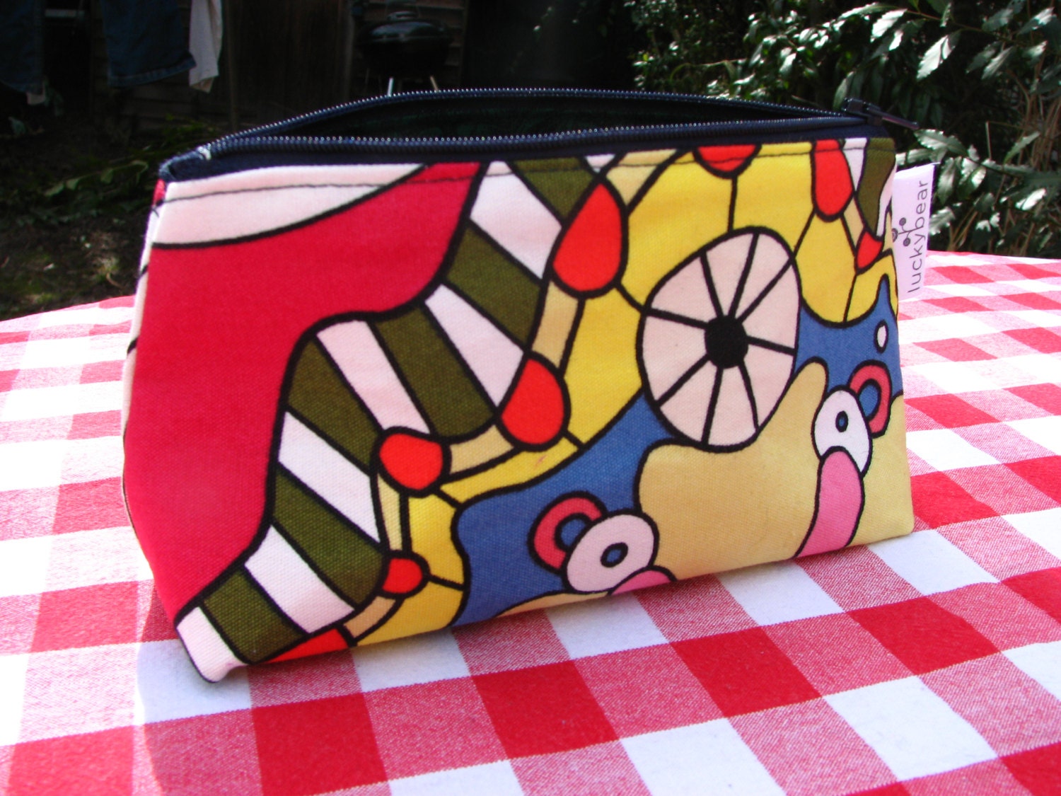 Boxy pouch in funky abstract fabric