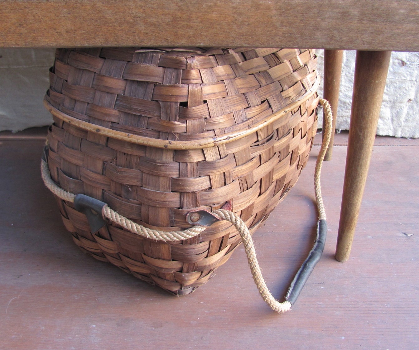 vintage c. 1960s primitive picnic basket with rope and leather handles