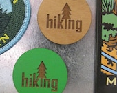 Two hiking, camping  OR teardrop trailer wooden coin magnets.  READY to SHIP. Green. Circle. Wilderness. Woods. Nature.