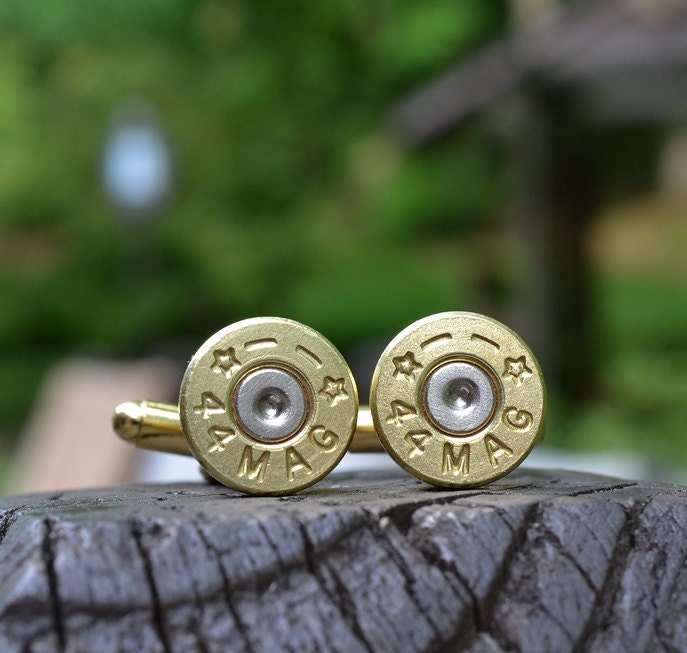 Bullet cufflinks fashioned from repurposed gold/brass Starline .44 magnum shell casings