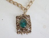 Memorial Day Sale Vintage necklace green rhinestone with ornate gold tone pendant