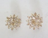 Memorial Day Sale Vintage earrings Sarah Coventry clip on gold flower or star
