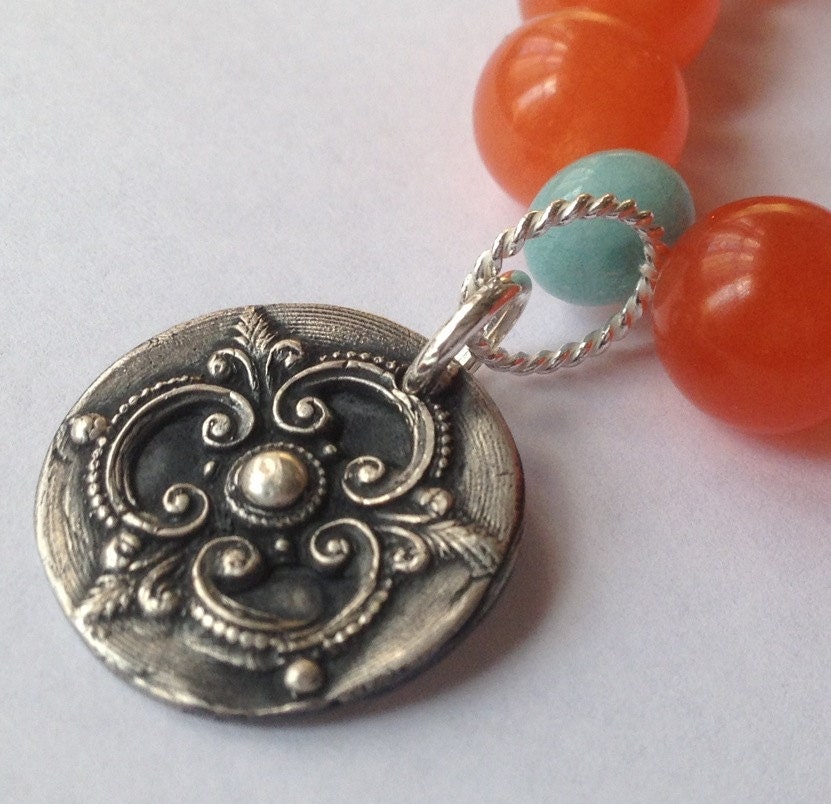 Fine silver and gemstone bracelets