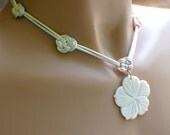 Variegated pastel satin Chinese knot necklace white carved flower shell pendant