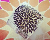 White leather flower cuff with gold and black flower pattern