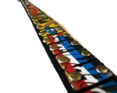 Studded leather belt featuring an art mosaic made from actual salvaged 1970s storybook record album cover