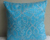 aqua blue pillow cover with white filigree embroidery