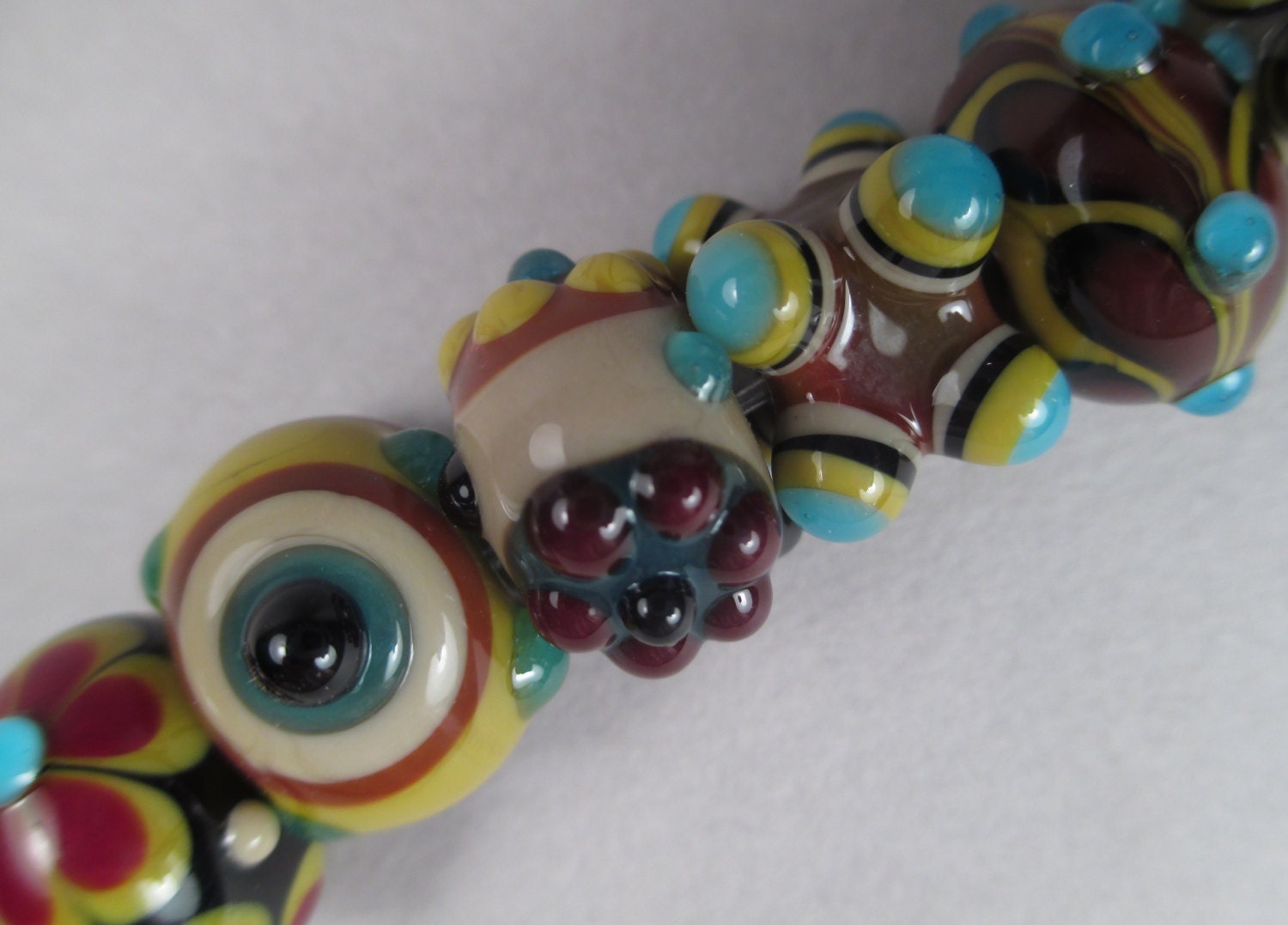Set of 8 Handmade Lampwork Art Glass Beads by Patti Cahill, sra -- Eclectic Mix in Browns and Blues