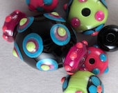 Set of 7 Handmade Lampwork Art Glass Beads by Patti Cahill, sra - Funky color scheme, black