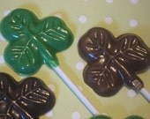 One dozen shamrock lollipop sucker party favors