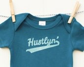 Hustlyn - hand screen printed baby onesie