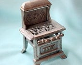 Antique Cast Iron Daisy Toy Stove