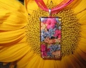 Forget Me Nots combined with Vibrant Verbena . Real pressed flowers.  Rectangle crystal clear hand cut glass 1 x 2 inch.