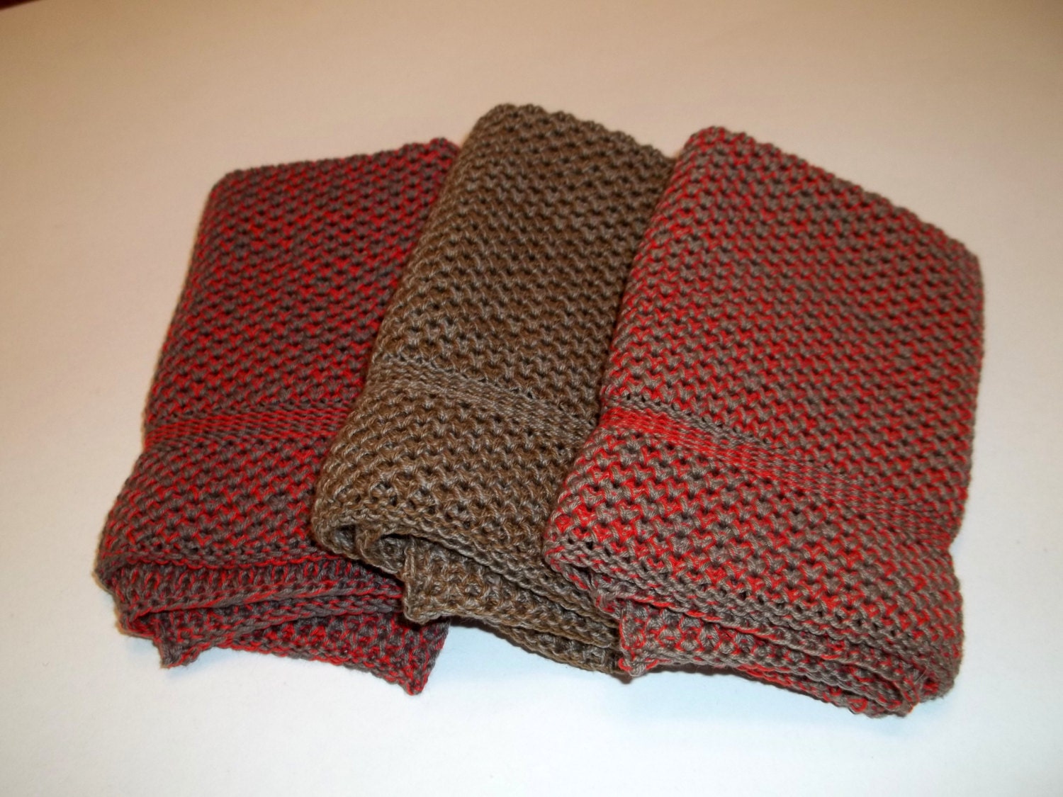Dishcloths knit in cotton in Khaki Tan/Orange, Acorn/Taupe and Orange/Sandstsorm