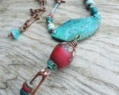 Bird and Egg Pendant Verdigris Patina Copper Metalwork Turquoise and Red Knotted Bohemian Style