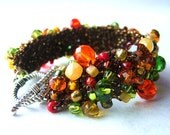 Crocheted Beaded Statement Cuff Bracelet in Oranges, Reds, Brown and Greens - 7"