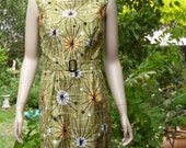 REDUCED price. 1950s CLASSIC Sheath Dress and matching Capelet. Fabulous ATOMIC print