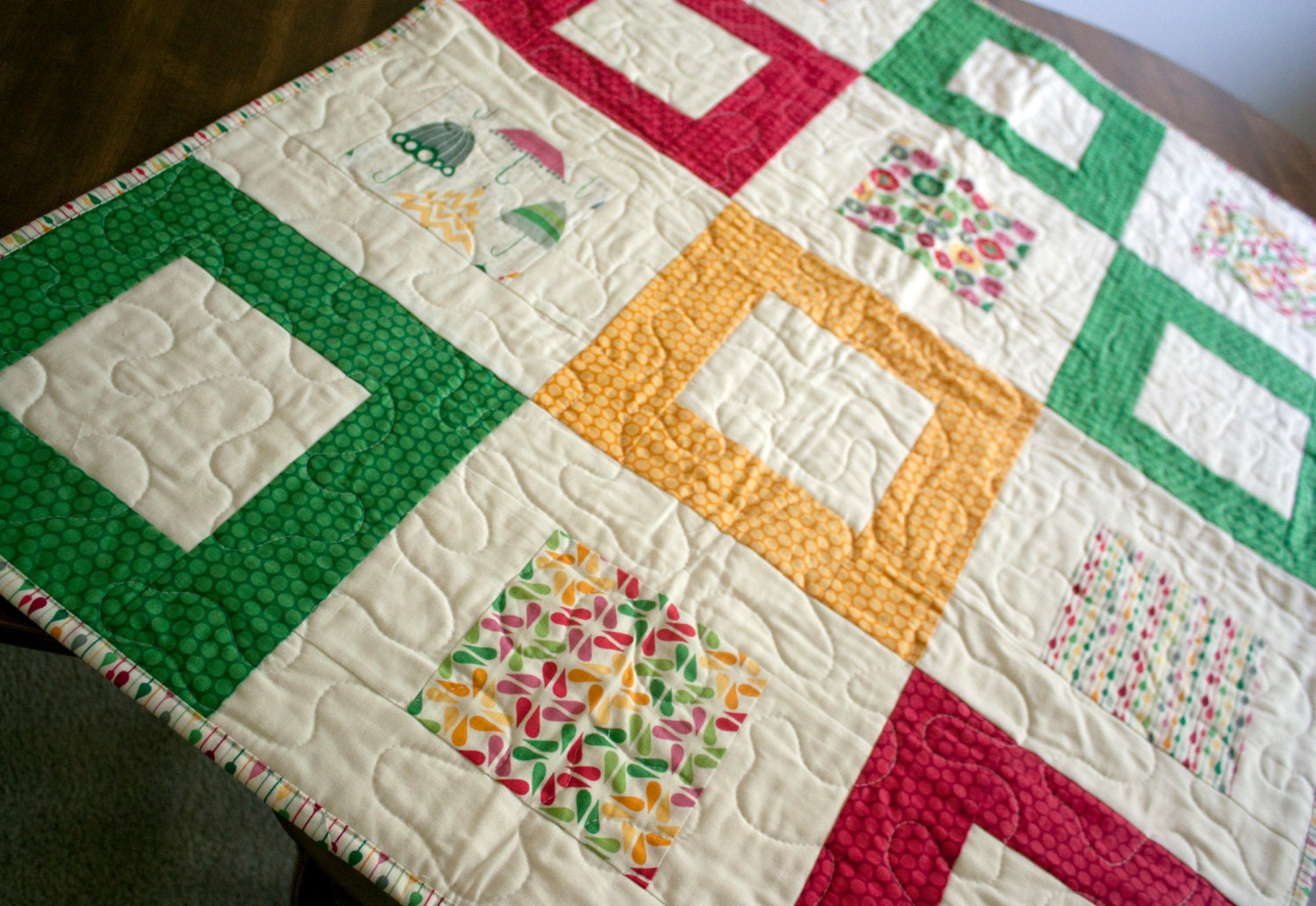baby girl quilt in rainy days fabric // pink green yellow modern block quilt