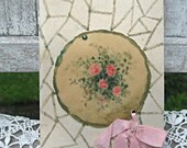 Antique Victorian card with celluloid flowers, pink ribbon