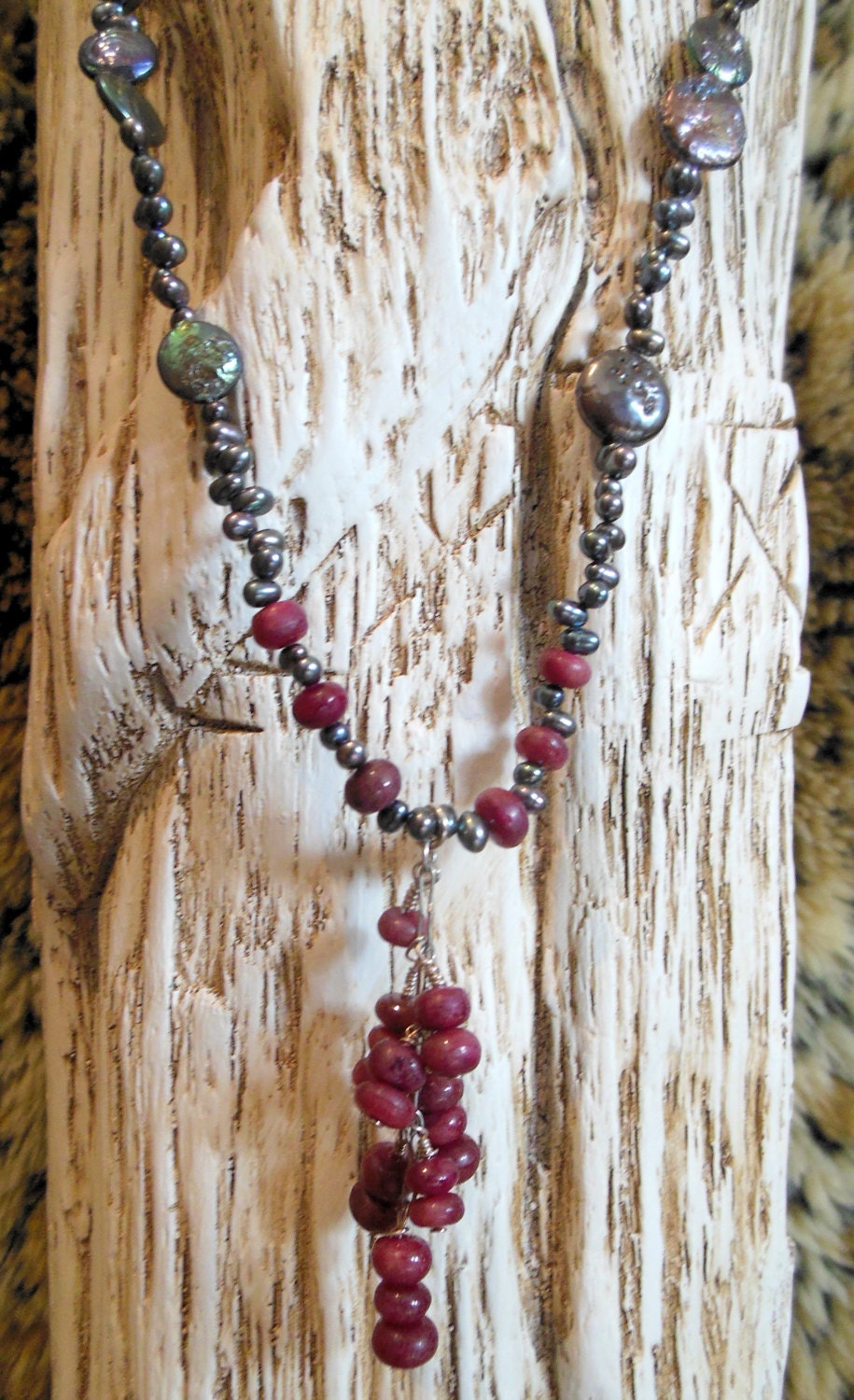 A Deep Drop of the Heart's Blood of Mother Earth      ( Ruby and Peacock Pearl Necklace)