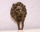antique brass lion wall hook
