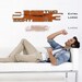 Outnumbered V Modern Wall Clock (Extra Large Rusted)
