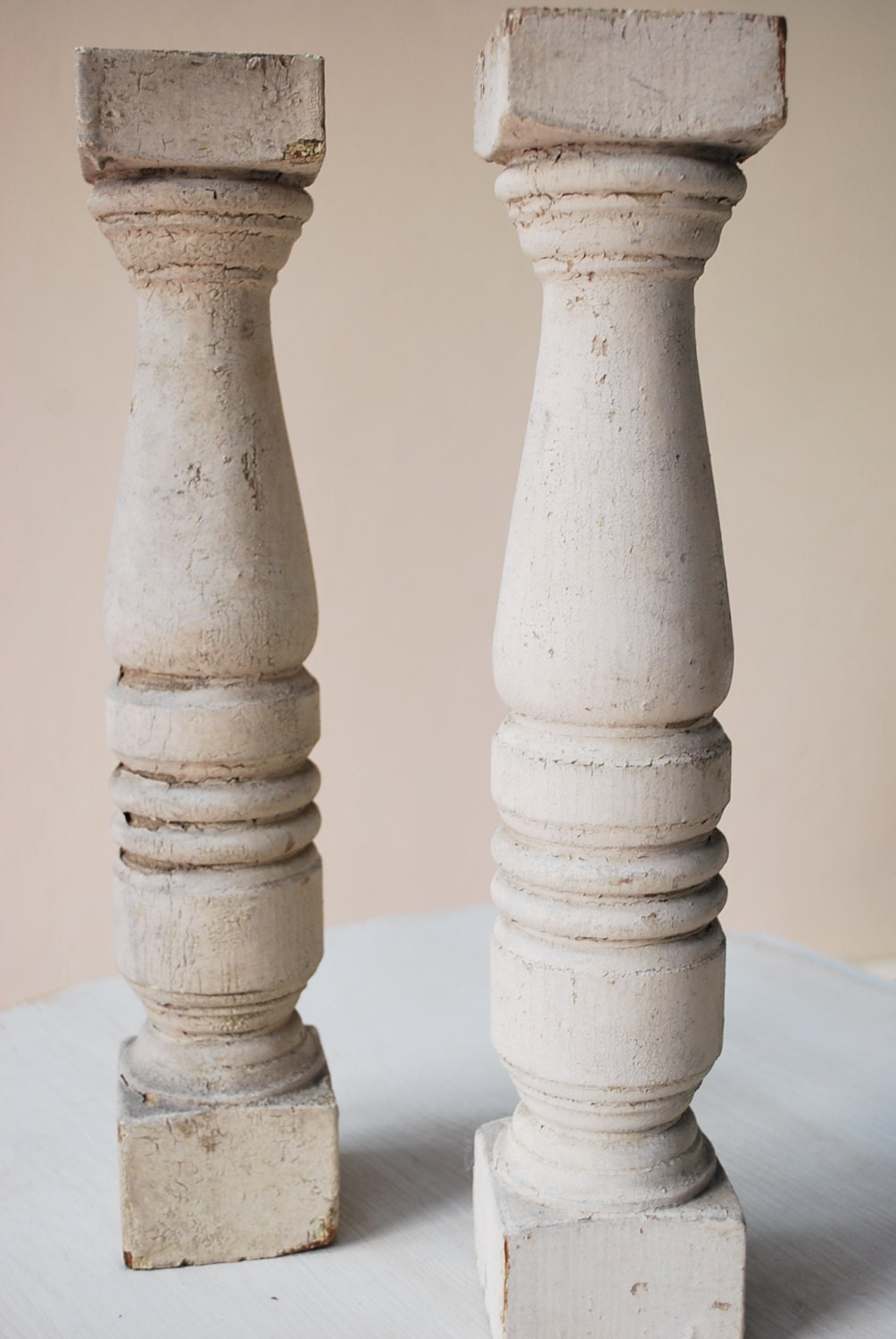Pair antique spindles, many coats of chipped paint, great look and patina