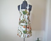 1950s Apron / Fabulous 50s barkcloth with wine bottles, corn and kitchen utensils