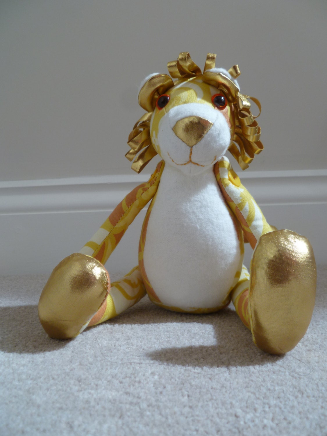 Yellow fabric lion toy
