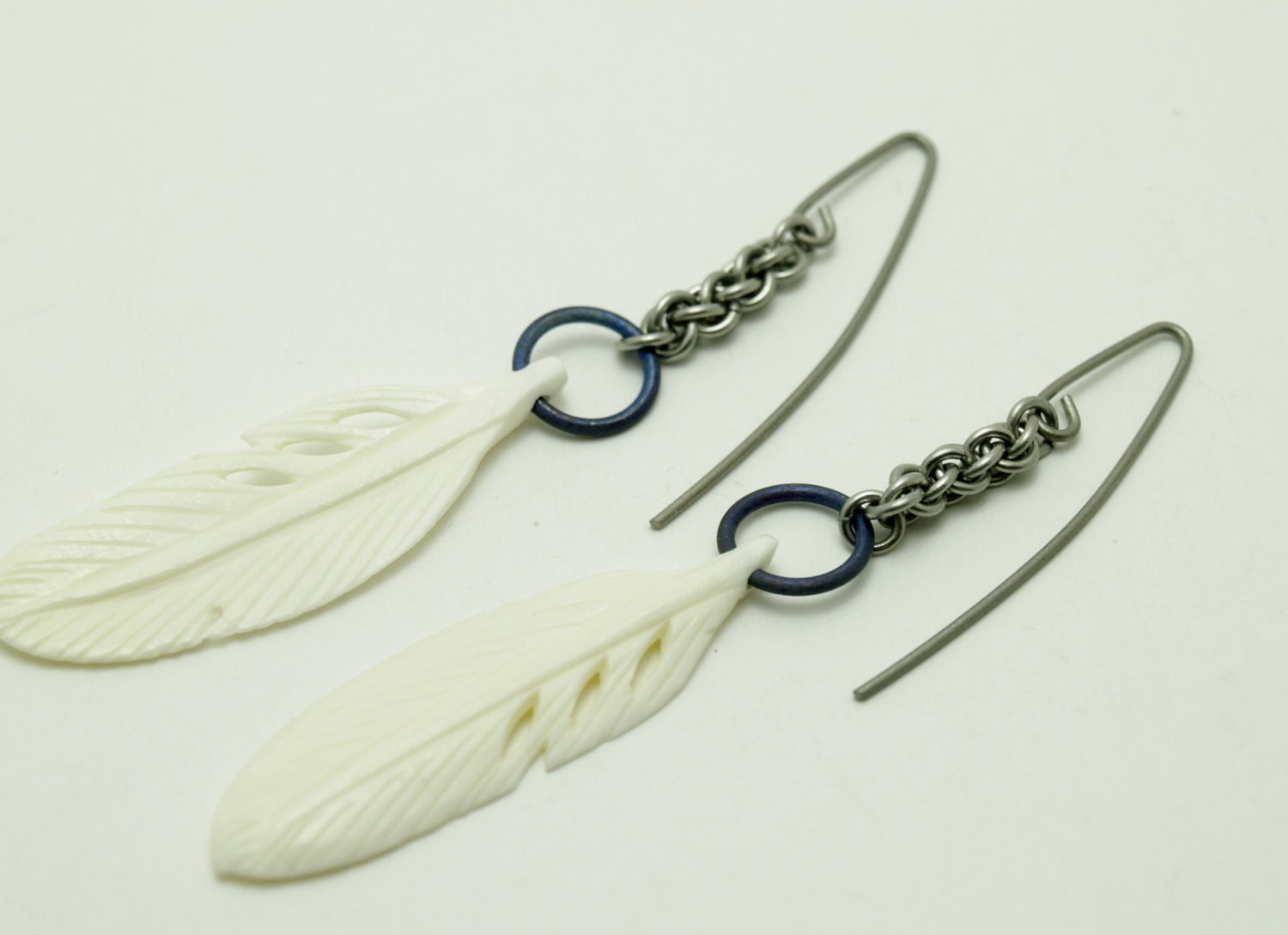 Titanium, Steel Jens Pind Linkage and Bone Feather Earrings