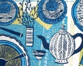 Table top setting linocut print.