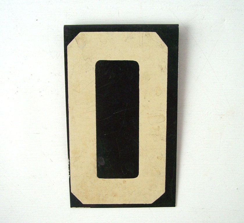 number 0 zero letter O vintage enamel metal sign hanging black and white personalized modern text type font large big typography typeface
