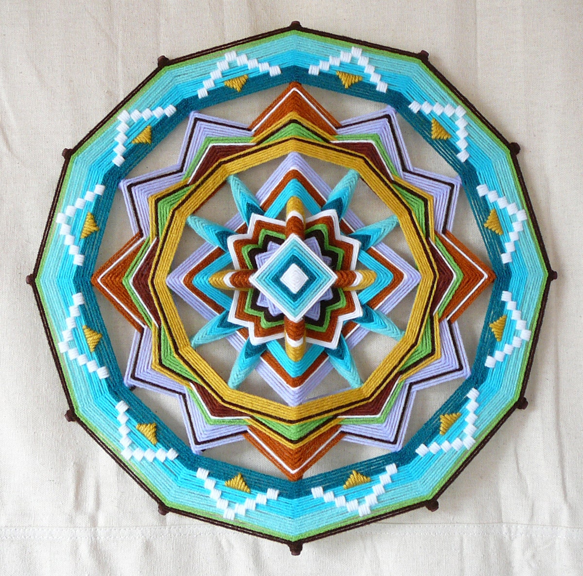 Finding Love, an 18 inch, 12-sided, Ojo de Dios, by custom order